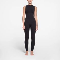 CONTOUR NYLON ZIP FRONT CATSUIT | GUNMETAL Compressive Elastane Unitard, Sleek High Stretch Black Unitard, Sleek High-stretch Black Unitard, Fitted Sleeveless Functional Unitard, Sleek High Stretch Unitard, Second-skin Athleisure Unitard, Functional Fitted Bodysuit, Sleek Stretch Unitard, Sleek Flexible Elastane Unitard