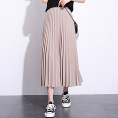 Exude elegance and class in our Solid Pleated Ankle Length Skirt. Featuring a long fit and elasticated waistband, this skirt is sure to keep you feeling comfortable and looking stylish all day long. Perfect for everyday wear, this versatile piece may be paired with a sweater or blouse for an effortlessly chic look to wear for casual days out or informal settings. Pleated Stretch Flared Maxi Skirt, Non-stretch Lined Flared Skirt, Pleated Non-stretch Flared Maxi Skirt, Trendy Pleated Stretch Skirt, Trendy Stretch Pleated Skirt, High Waist Stretch Pleated Skirt, Stretch Pleated Midi Skirt, Non-stretch Midi Pleated Skirt, Non-stretch Long Lined Skirt