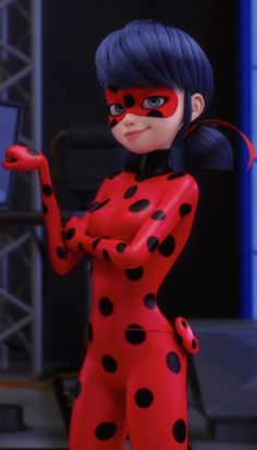 a woman in a red and black dress with polka dots on her face is pointing at something