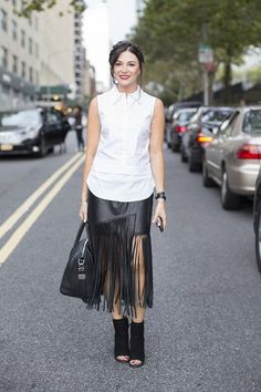 New York Fashion Week style (Vogue.co.uk) September 2014 April Hennig, VP at Bergdorf Goodman "I'm wearing a Le top with a Tamara Mellon skirt, Givenchy shoes and a bag." Fringe Skirt Outfit, Fringe Leather Skirt, Fashion Week Style, New York Fashion Week Street Style, Nyfw Street Style, Women Street, Street Style Inspiration