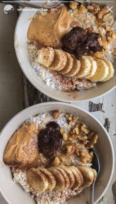 two white bowls filled with oatmeal and fruit on top of each other