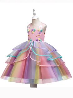 Infused with the magic of a fairy tale, this girl's dress is a cascade of pastel tulle, adorned with a garden of fabric flowers. The bodice is a canvas for intricate floral designs, inviting close admiration. The full skirt, featuring a spectrum of gentle colors, is ready for any festive spin or enchanting entrance. This dress is a delightful choice for any young girl attending a formal event, participating in a pageant, or celebrating a milestone. US Length (inches) Bust size (inches) 3-4Y 23.6 Spring Fairytale Fairy Dress For Dress-up, Whimsical Rainbow Princess Dress For Dress-up, Multicolor Sleeveless Princess Dress With Ruffles, Spring Rainbow Tutu Dress With Ruffles, Multicolor Fairy Dress For Dress-up, Multicolor Ruffled Fairy Dress For Summer, Whimsical Ruffled Tutu Dress For Garden Parties, Multicolor Tulle Dress With Ruffles, Princess Style Multicolor Fairy Dress For Summer