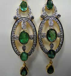 Art Deco 18 K solid gold Diamnds and Emerald dangle earrings. Beautiful one of type pair in very good condition. Length-7.5 cm, width-1.5 cm, the weight of pair-11.210 grams, material-18 K gold, Diamonds and emeralds. Diamond VS GH, approx 2.5 cats. Traditional Oval Earrings For Formal Occasions, Fine Jewelry Hallmarked Bridal Drop Earrings, 22k Gold Gemstone Earrings For Formal Occasions, Gold Pendant Earrings With Elegant Design, Yellow Gold Pendant Earrings For Anniversary, Traditional Green Diamond Earrings For Formal Events, Traditional Green Diamond Earrings For Formal Occasions, Gold Hand-set Chandelier Earrings For Formal Occasions, Formal Yellow Gold Diamond And Emerald Earrings