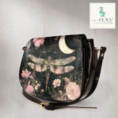 Gothic Celestial Firefly Crossbody Shoulder Bag Dark Academia Goth Animal Saddle Bag Magic Witchcraft Nature Forest Purse Moon Stars Cottage Core Streetwear Satchel  Please scroll down and continue reading             Our latest arrival: the epitome of sophistication and practicality in our new shoulder bag. Fashioned from premium PU leather and embellished with beautiful local printing, this accessory stands out with its dimensions of 10.24"(L) x 4.13"(W) x 8.66"(H). Thoughtfully engineered to Gift Black Saddle Bag With Adjustable Strap, Black Saddle Bag With Adjustable Strap As Gift, Black Saddle Bag With Adjustable Strap, Bag Dark Academia, Gothic Celestial, Dark Academia Goth, Magic Nature, Bag Dark, Nature Forest