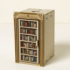 a wooden book case with books on it