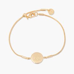 Discover a modern classic with the Wren Bracelet. Handcrafted with a gold snake chain, this unique design is engraved with your personalized initials and adjustable for the perfect fit. An enchanting addition to any look. Are you ready to make a lasting impression? Available in 14k gold plated brass Disc size: 1/2" Adjustable snake chain up to 7" Lobster claw closure With engraving this item is FINAL SALE SKU: BYB1097 Classic Engraved Snake Chain Jewelry, Adjustable Monogram Jewelry For Personalized Gift, Personalized Adjustable Monogram Jewelry, Personalized Monogram Adjustable Jewelry Gift, Personalized Monogram Adjustable Jewelry, Elegant Monogram Name Bracelet For Everyday, Classic Adjustable Bracelet With Initials, Classic Adjustable Name Bracelet, Classic Adjustable 14k Gold Name Bracelet