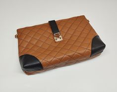 An elegant classic style bag with a legendary design that marks deeply the modern fashion, made of excellent quality genuine greek grained calf leather (calfskin). The bag's inner space includes 1 zipped pocket and 2 additional pockets on the other side.  Dimensions: Height 14 cm x Length 20 cm x Width 6 cm (5.5 x 7.9 x 2.4 inches). The bag can be used as a top handle bag or envelope bag. The total chain's length is about 130 cm (51.18 inches). We may apply any preferable length for the chain also, according to your demands. The female model that has been used for the measurements is 1.67 m tall (65.7 Inches). The bag arrives with a special fabric case also, as a cover for it and a small token of appreciation for selecting ''Virsa Bags''. Please expect your package delivered early: You may Luxury Brown Bag With Fold Over Clasp, Business Brown Shoulder Bag With Fold Over Clasp, Luxury Brown Shoulder Bag With Fold Over Clasp, Luxury Brown Flap Bag With Fold Over Clasp, Classic Envelope Bag For Office, Classic Brown Flap Bag With Fold Over Clasp, Brown Envelope Bag For Business, Brown Satchel Flap Bag With Fold Over Clasp, Classic Brown Shoulder Bag With Fold Over Clasp