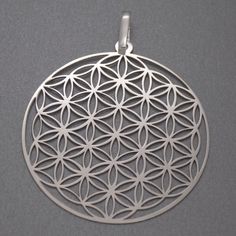 Amphora Jewelry offers you a Stunning Pendant, that represents the Flower of Life. This Sacred Pendant is made of Solid Sterling Silver and has 925 Hallmark Stamp. The dimensions of the Pendant: Length: 5.4 cm (incl. bail), Width: 4.3 cm, Inner Bail: 0.4 cm Shipping and handling: The item/s will be shipped to your address within 1 business day after the payment is cleared. Please, contact us if you want to announce a different shipping address or if you need an additional information. The delive Flower Of Life Mandala, Mermaid Locket, Flower Of Life Symbol, Yoga Pendant, Life Symbol, Cz Pendant, Sterling Silver Flowers, Flower Of Life, Silver Flowers