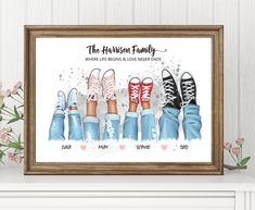 an art print of four pairs of shoes with the names of each family on them