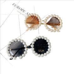 "Pearl" Sunglasses Vintage Round Pearl Sunglasses Women New Luxury Brand Designer Fashion Alloy Oversized Frame Party Glasses Retro Shades STYLE-New Brand Design, It is Suitable For Any Face, Show Your Unique And High-end Taste. Suitable for Shopping, Party, boating, or Other Outdoor Activities Enthusiasts Supplied in a high quality case and cleaning soft cloth Gender: WOMEN Frame Material: ALLOY Style: Round Lenses Optical Attribute: Gradient Lenses Optical Attribute: UV400 Lens Height: 65mm Le Summer Gift Sunglasses, Elegant Adjustable Plastic Sunglasses, Elegant Party Sunglasses With Uva Protection, Round Tinted Sunglasses For Party, Round Tinted Sunglasses For Parties, Elegant Glass Sunglasses For Summer, Round Tinted Lens Sunglasses For Parties, Party Sunglasses With Tinted Round Lenses, Elegant Plastic Sunglasses For Spring