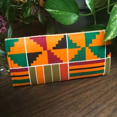 Bright and assorted ankara wallets. Lots of bright colors. Multicolor Rectangular Travel Wallet, Green Rectangular Trifold Wallet, Multicolor Rectangular Clutch With Card Slots, Multicolor Rectangular Wallet With Card Slots, Multicolor Rectangular Trifold Wallet For Daily Use, Multicolor Trifold Wallet With Card Slots, Simple Wallet, Backpack Outfit, Kente Cloth