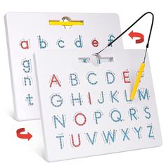 two letters and numbers are attached to a white board with a yellow pen on it