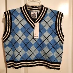 Slightly Cropped Sweater Vest. Pretty Argyle Pattern. Runs Roomy. Brand Is The Ragged Priest, Sold At Urban Outfitters. Fitted Blue Sweater Vest For Winter, Blue Vest Sweater For Fall, Retro Urban Outfitters Tops For Fall, Trendy Blue Sleeveless Sweater, Trendy Sleeveless Blue Sweater, Blue Vest-style Sweater For Fall, Trendy Blue Winter Vest, Trendy Blue Crew Neck Sweater Vest, Trendy Fitted Blue Sweater Vest