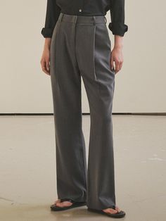 These are loose fit bootcut slacks with a minimalist vibe combined with a retro fit. The tuck pleats on the front make it more comfortable and trendy to wear. The back pocket, which uses less thread, is made of fake.- Can be styled with a belt- Practical with usable pockets on both sides- Can be used as a setup with a jacket made of the same fabric.*The color of the product is closer to the actual color in the detailed cut than in the cut worn by the model due to lighting. There may be slight differences in color depending on the type of monitor and environment. Classic Pleated Wide Leg Pants, Classic Fitted Pleated Pants, Pleated Full Length Wide Leg Office Pants, Pleated Full Length Wide Leg Pants For Office, Full Length Pleated Wide Leg Pants For Office, Classic Pleated Wide Leg Dress Pants, Classic Pleated Ankle-length Pants, Classic Pleated Wide-leg Dress Pants, Pleated Full-length Wide Leg Work Pants