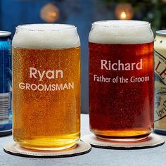 four different types of beer are lined up on a table