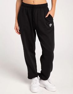 NIKE Sportswear Club Womens Oversized Fleece Sweatpants - BLACK | Tillys Nike Cuffed Sweatpants Women, Black Nike Sweatpants Outfits Women, Nike Sweat Pants Outfit Women, Nike Pants Women, Black Sweatpants Women, Nike Relaxed Fit Joggers For Gym, Nike Athleisure Sweatpants For Gym, Nike Relaxed Fit Moisture-wicking Joggers, Nike Athleisure Sweatpants With Comfort Waistband