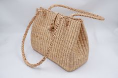 These bags would make terrific gifts, too! (start thinking about gifts for Mother's Day!) Our natural straw bags are all stylish and natural. Made of straw, with sophisticated craftmanship, is georgeous. Fabric lining. Excellent beach bag. We offer the Highest Quality and Lowest prices Guranteed!!  Detail++ Material: water hyacinth Closure: cream lining  Approx size : Wide 5.5 inches Length 12 inches Height 10 inches Drop length : 12 inches SHIPPING: We Ship from Thailand and will be SHIPPED via Eco-friendly Beige Straw Bag As Gift, Elegant Natural Rectangular Bag, Elegant Basket Beach Bag For Travel, Elegant Summer Beach Bag In Natural Color, Elegant Everyday Basket Bag, Elegant Basket Bag For Vacation, Elegant Basket-shaped Bag For Vacation, Elegant Natural Straw Tote Bag, Elegant Beige Rectangular Beach Bag