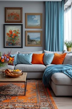 a living room filled with furniture and pictures on the wall above it's windows