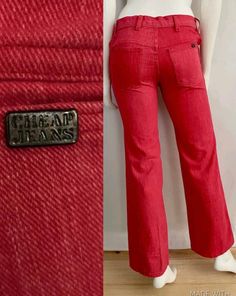 "Vintage 70's Red, Low Rise, Bell Bottom, Jeans by Cheap Jeans (S) 1378 These Ladies jeans come in red denim and are low waisted, with two front pockets with two back pockets with a bell bottom leg shape. The denim is soft like a pant and does not stretch.  Cotton/Polyester Blend *These pants are slightly too small for the mannequin and the zipper works properly. *Free shipping within the US, and will go Priority Mail for a quick delivery! Size: (S) Modern Day 2 Waist: 28\" Hips: 32\" Inseam: 30 1/2\" Rise: 9 1/2\" (front) 11\" (back) Bell Bottom Width: 10 1/2\" Weight: 1 pound 2 oz *Follow Freshandswanky on Instagram" Low Rise Bell Bottom Jeans, Ladies Jeans, Red Denim, Cheap Jeans, Jean Vintage, Bottom Jeans, Womens Jeans, Bell Bottom, Low Waisted