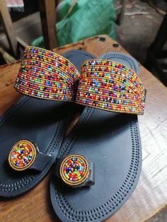 Our beautiful and unique african sandals comes with a colorful touch, suitable for any event, get yours today or gift a loved one Handmade Multicolor Barefoot Sandals For Vacation, Multicolor Round Toe Sandals For Festivals, Traditional Multicolor Barefoot Sandals For Vacation, Traditional Multicolor Sandals With Round Toe, Multicolor Toe Ring Sandals With Single Strap For Festivals, Multicolor Single Toe Strap Sandals For Festivals, Open Toe Multicolor Barefoot Sandals For The Beach, Multicolor Round Toe Toe Ring Sandals For Festivals, Traditional Barefoot Sandals For Vacation Festivals