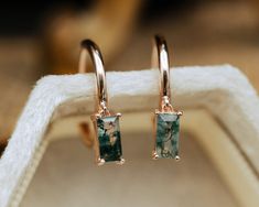 These delicate earrings are crafted with meticulous attention to detail. The focal point is the... Miniature Forest, Staghead Designs, Antique Gift, Agate Earrings, Mens Engagement, Custom Ring Designs, Shiny Things, Delicate Earrings, Shop Engagement Rings