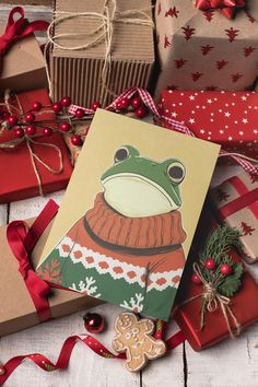 christmas presents are piled on top of each other and wrapped in brown paper with red ribbon