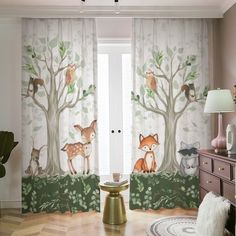 the curtains in this room are decorated with woodland animals and trees, as well as deers