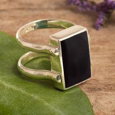 This rather unique ring can change to suit your mood! It consists of rectangular stones of onyx and jasper centering double bands of sterling silver. If you decide the other stone is better that day, all you have to do is flip the band around to show the other side. It is designed and crafted by Peruvian artisan Fermin with beautiful Andean gemstones. Faceted Green Onyx Jewelry, Silver Faceted Onyx Jewelry, Luxury Onyx Cabochon Jewelry, Adjustable Onyx Ring With Polished Finish, Silver Onyx Cabochon Rings, Jasper Ring, Silver Buttons, Jewelry Packaging, Favorite Rings