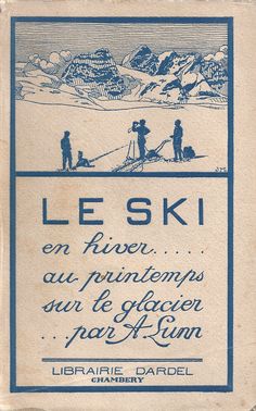 an old book with blue lettering on it and two men standing in the snow near mountains