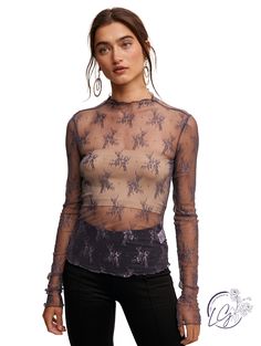 Add a touch of elegance to your dance outfit with the Dance The Night Layering Top! Featuring a beautiful mesh embroidery lace design, a mock neck and long sleeves, this top is perfect for layering over a tank or leotard. The lightweight sheer fabrication allows for comfortable movement while staying stylish. Don't let your dance moves be limited, dance the night away in style with this top! 90% Nylon 10% Spandex High Stretch Mesh Top For Fall Parties, High Stretch Mesh Party Top, Fitted Lace Mesh Top For Fall, Party Mesh Top With Lace Trim And Stretch, Sheer Lace Mesh Top For Fall, Stretch Lace Long Sleeve Top For Night Out, Party Top With Sheer Sleeves And High Stretch, Stretch Long Sleeve Lace Top For Night Out, Stretch Lace Top With Long Sleeves For Night Out