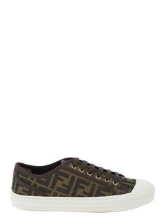 Women's Fendi Ff Logo Low-top Sneakers - Brown Evoking the look of a tennis shoe, Fendi's low-top sneakers are animated with the signature FF monogram. This Italian-made pair rests on a thick sole. 65% polyamide/35% cotton Round toe Lace-up vamp Rubber/plastic sole Made in Italy SIZE Sole, 0.75" (20mm) ABOUT THE BRAND The epitome of elegance and fine craftsmanship, Fendi was founded in 1925 in Rome by Adele and Edoardo Fendi. Today, the founders' granddaughter and Creative Director, Silvia Ventu Low-top Brown Sneakers With Logo, Brown Low-top Sneakers With Logo, Brown Low-top Sneakers With Logo Print, Brown Sneakers With Logo Print And Round Toe, Brown Round Toe Sneakers With Logo Print, Ff Monogram, Fendi Sneakers, Embossed Boots, Prada Sneakers