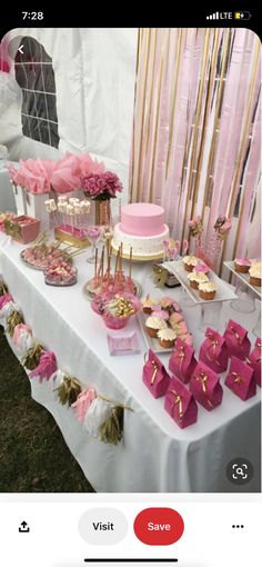 a table topped with pink and gold desserts