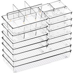 six clear storage bins are stacked on top of each other, with holes in the bottom