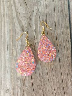 Resin opaque pink glitter earrings. Gold plated nickel free. Pink Drop Earrings With Ear Wire, Pink Dangle Teardrop Earrings For Gift, Pink Hypoallergenic Teardrop Earrings, Pink Hypoallergenic Party Jewelry, Pink Hypoallergenic Jewelry For Parties, Pink Glitter Drop Earrings, Pink Hypoallergenic Drop Jewelry, Pink Teardrop Earrings For Party, Hypoallergenic Teardrop Earrings For Party