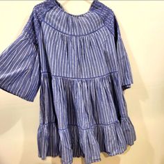 Free People Lola Striped Embroidered Dress Nwt New With Tags Size Small Pull On Style. Criss Cross Back 100% Cotton Blue And White Casual Blue Mini Dress With Floral Embroidery, Casual Tunic Dress With Embroidered Hem, Blue Spring Dress With Embroidered Hem, Blue Dress With Embroidered Hem For Spring, Blue Embroidered Mini Dress, Blue Embroidered Cotton Mini Dress, Blue Embroidered Tunic Dress For Spring, Blue Dresses With Embroidered Hem, Spring Blue Embroidered Mini Dress