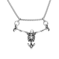 PRICES MAY VARY. Elegant Gothic Design: Our silver skull necklace features an intricately crafted pendant that embodies the dark elegance of gothic fashion, perfect for those who seek to express their unique style with a touch of mystery. Stainless Steel Durability: Made from premium stainless steel, this necklace is built to last, offering resistance to rust, corrosion, and tarnish, ensuring it will maintain its shine and strength over time. Hypoallergenic Silver Finish: The necklace boasts a h 80s Goth Jewelry, Mens Silver Necklaces, Unique Mens Necklace, Earth Tone Clothes, Skull Knife, Alt Jewelry, Skull Sketch, Cool Necklace, Character Clothing