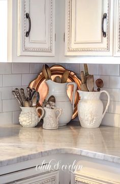 the kitchen counter is clean and ready to be used as a utensil holder