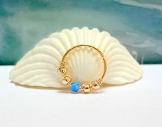 Fire Blue Opal 2mm Cartilage Ring Gold by HelenCollectionJewel Hoop Conch Piercing, Conch Ring, Fire Blue, Conch Hoop, Cartilage Ring, Helix Hoop, Conch Earring, Gold Filled Hoops, Conch Piercing