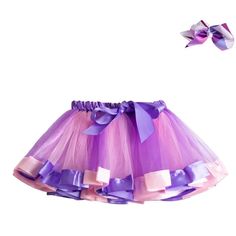 Twirl in style with the Dance Mini Tutu Skirt! Perfect for ballet, parties, or costume fun. This tutu features layers of soft tulle for a fluffy, enchanting look. Elastic waistband ensures a comfy fit. Add whimsy to your wardrobe today! Rainbow Kids Party, Unicorn Skirt, Girl Skirts, Girls Cake, Active Wear Dresses, Girl Tutu Skirt, Tulle Skirts, Layered Tulle Skirt