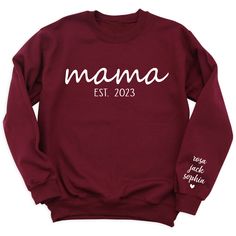 👩💕 Celebrate your journey as a mom with our Mama Est Since T-Shirt personalized with your kid's names! 🌟 Customize it for a special touch! 😍 Get yours now and wear your mom pride in style! For different Mother's Day t-shirt designs, please take a look at our Mother's Day collection. https://www.greatwoodboutique.com/collections/mothers-day-tee-shirts Mama Shirt Ideas Vinyl, Custom Name Tops For Mother's Day Gift, Personalized Long Sleeve T-shirt For Mother's Day, Family Matching Sweatshirt With Name Print For Mother's Day, Personalized Tops For Mother's Day, Custom Text Long Sleeve T-shirt For Mother's Day, Personalized Tops For Family Occasions On Mother's Day, Personalized Crew Neck Tops For Family Matching, Personalized Crew Neck Top