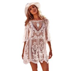 Show off your boho side with this one-of-a-kind Wanderlust Vibes Lace Bikini Cover Up Dress. Featuring beautiful flare sleeve lace embroidery, this mini dress adds a touch of elegance and sexiness to your beach look. Material: Lace, Cotton One Size : Length 90cm Chest 94cm Sleeve 36cm Bohemian Hollow Out Dress For Beach Cover-up, Bohemian Lace Patchwork Summer Cover-up, Fitted Lace Summer Beach Dress, Lace Mini Dress For Beachwear, Beachy Lace Dress For Spring, Beachy Lace Dresses For Spring, Bohemian White Beach Dress With Hollow Out, White Bohemian Beach Dress With Hollow Out, White Lace Dress For Beach Party