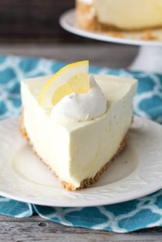 a slice of lemon pie on a white plate