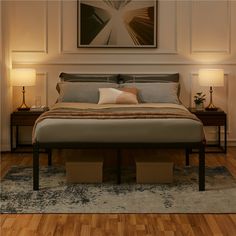 a large bed sitting on top of a wooden floor next to two night stands with lamps