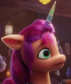 an animated pony with pink hair and a unicorn's horn on its head is looking at the camera