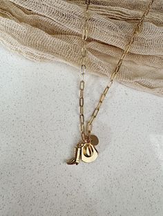 14K gold filled 7mm disc and mini boot and hat  charm necklace. Handstamped to order. 16in paperclip chain. Perfect for bridesmaids gifts or any occasion. Cowboy Boot Necklace, Cowboy Romance, Cowgirl Gifts, Western Gifts, Cowboy Boot, Bridesmaids Gifts, Initial Necklace, Hand Stamped, Charm Necklace