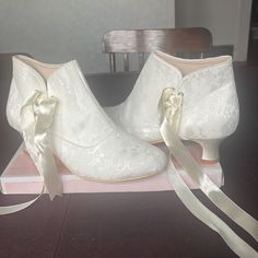 Brand New Side Lace Up Boots Has Satin Heels 2 In Really Close To Kitten Heels Never Worn They Seem More Fitting For A Bride More Ivory Than White Victorian# Size 42 Kitten Heels# Victorian Wedding Shoes, Elegant Cream Ankle-high Booties, Elegant Wedding Booties With Round Toe, White Lace-up Boots For Wedding, White Round Toe Booties For Formal Occasions, White Round Toe Formal Booties, White Formal Booties With Round Toe, Elegant White Booties With Round Toe, Cream Closed Toe Formal Boots