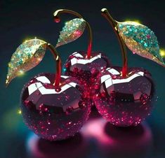 three shiny glass cherries with leaves and glitters on them, sitting next to each other