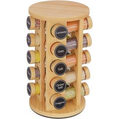 a wooden spice rack with six different spices