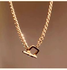 Shop one of our trendiest pieces our 18k gold Plated 3pc set Layering Necklace comes with a square chunky clasp choker chain, Gold Heart chain and a Brown square cubic zirconia stone necklace. Lead and Nickel Free. Gold Square Pendant Jewelry For Formal Occasions, Rose Gold Plated Charm Necklaces, Rose Gold Plated Chain Necklace, Elegant Gold Square Pendant Jewelry, Trendy Gold Plated Chain Necklace For Formal Events, Trendy Gold Plated Chain Necklace For Formal Occasions, Elegant Link Chain Choker, Elegant Square Pendant Necklace Tarnish Resistant, Chic Adjustable Rose Gold Chain Necklace