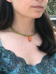 Handmade green beaded choker necklace with genuine orange quartzite stone pendant! Simple design, yet adds a bold and fun touch to any outfit. Available in multiple sizes. Perfect for summer and days at the beach. Please reach out with any questions or concerns (sizing, adjustments, repairs, etc.) Adjustable Beaded Necklaces With Natural Stones For Summer, Adjustable Beaded Necklaces With Gemstone Beads For Summer, Adjustable Natural Stone Beaded Necklaces For Summer, Adjustable Natural Stones Beaded Necklace For Summer, Adjustable Gemstone Beaded Necklaces For Summer, Casual Green Choker Jewelry, Adjustable Orange Necklace For Summer, Summer Orange Beaded Necklaces, Green Bohemian Choker For Summer